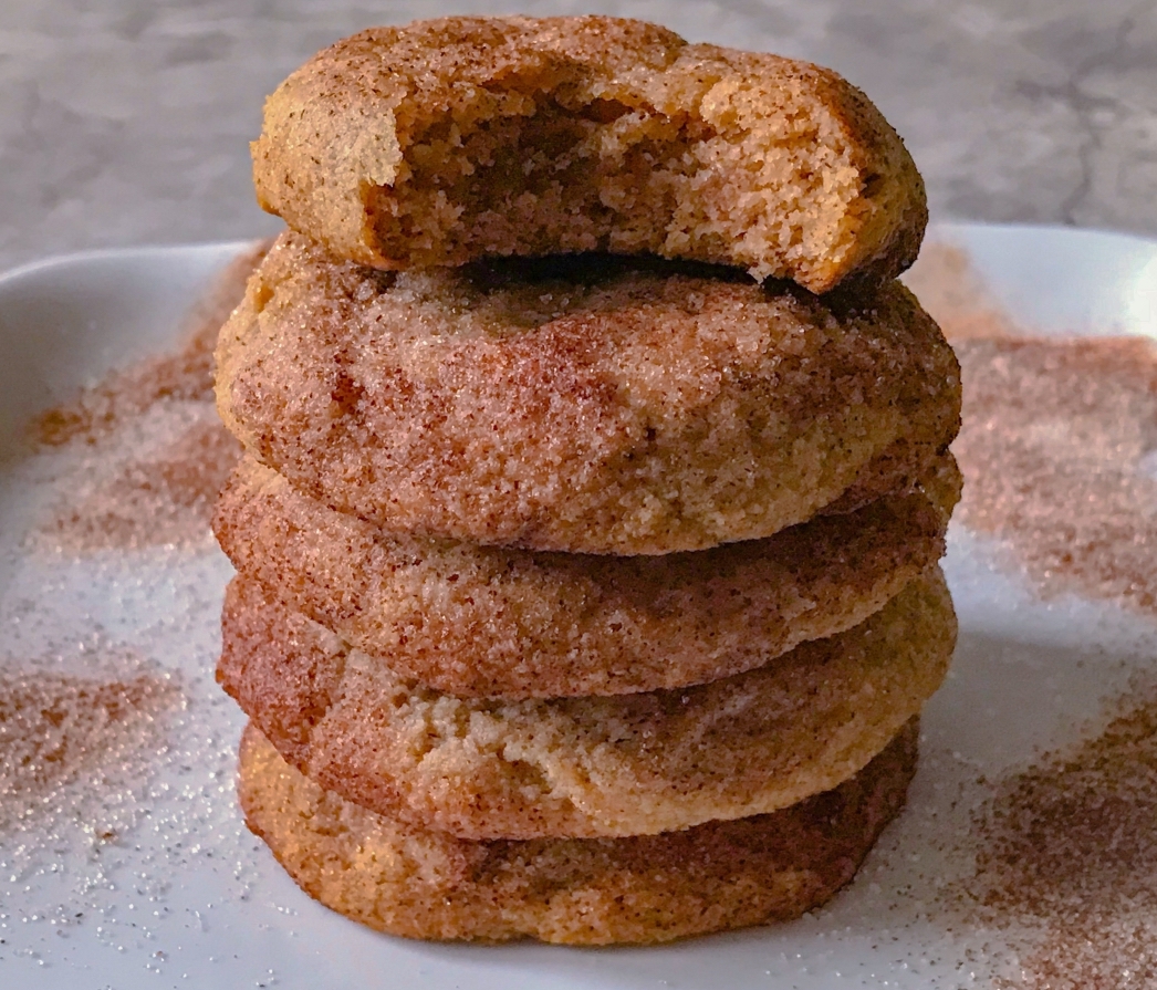 Close up of keto snickerdoodle cookies stacked on top of each other