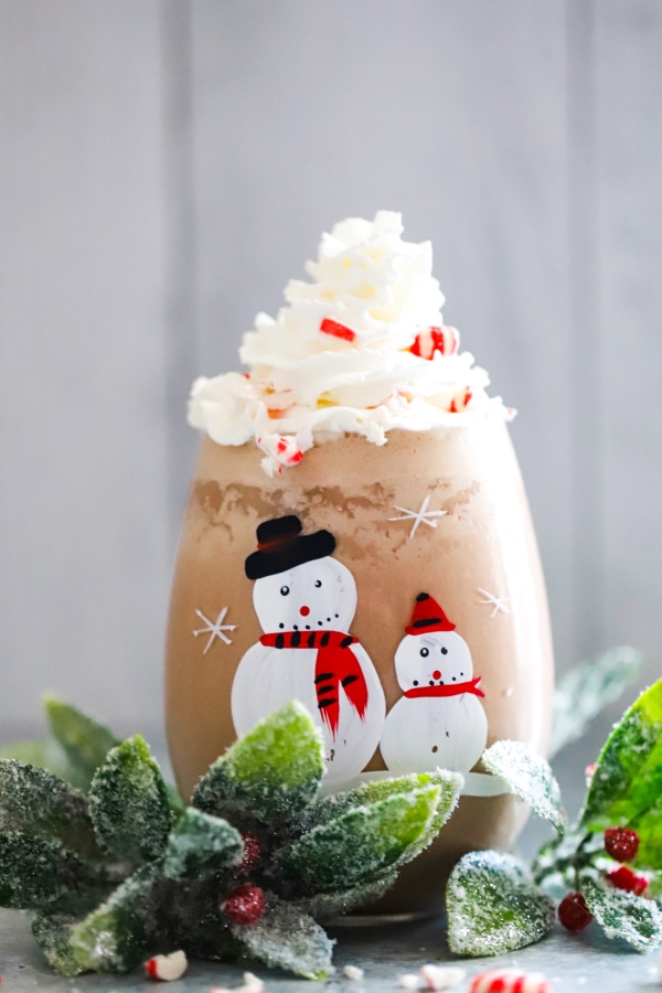 decorative snowman glass willed with peppermint chocolate shake