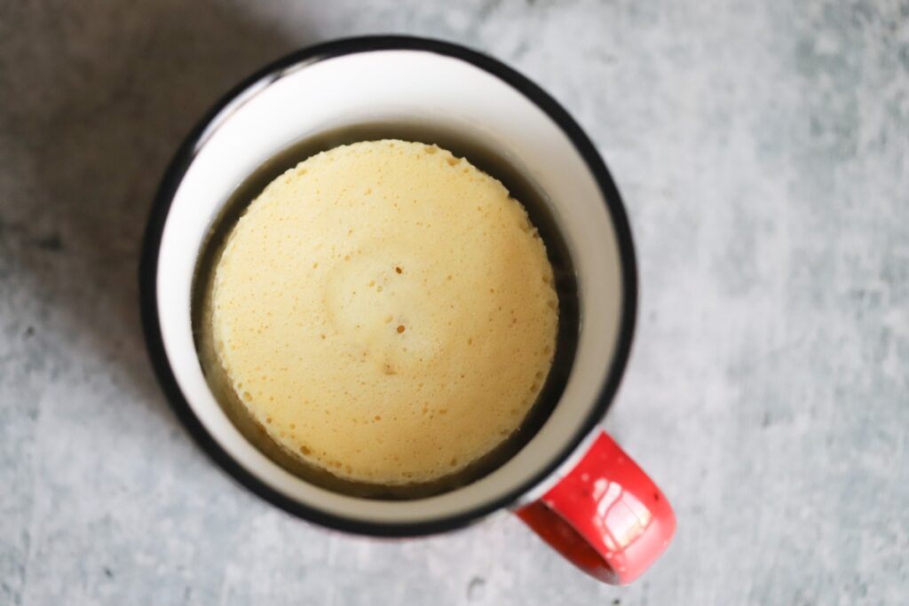 top view of cooked keto bread in a mug