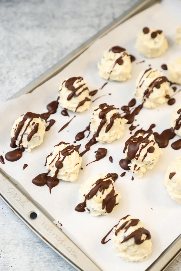 chocolate drizzled on cookie dough bites