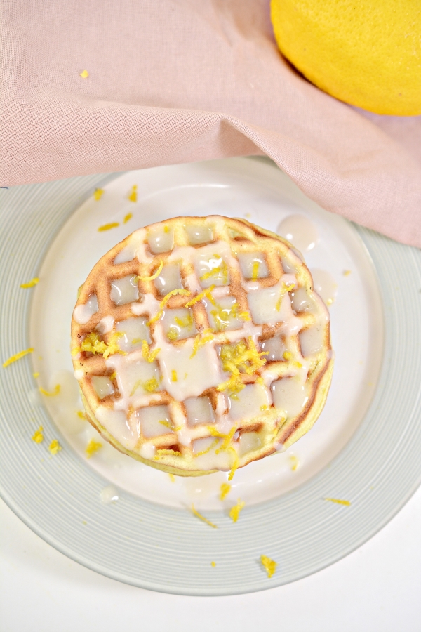 top view of stacked lemon cake chaffles on a plate