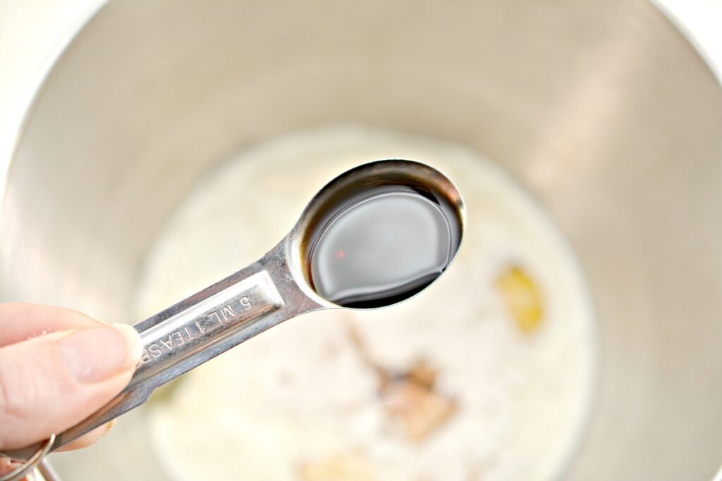 Vanilla extract in a measuring spoon