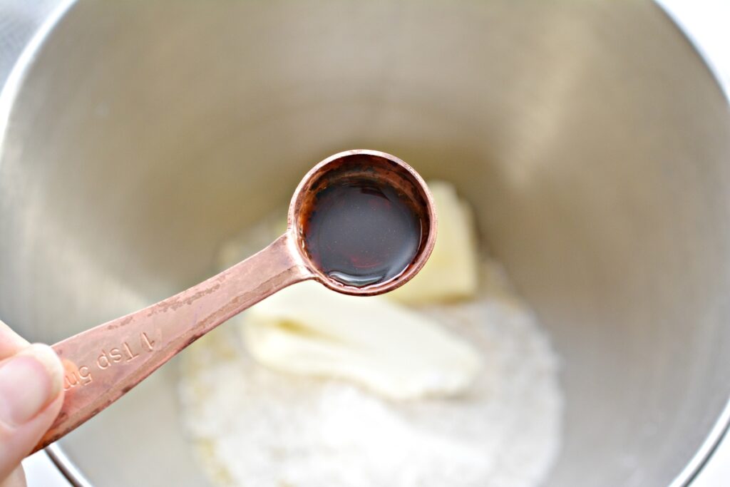 top view of vanilla extract in teaspoon