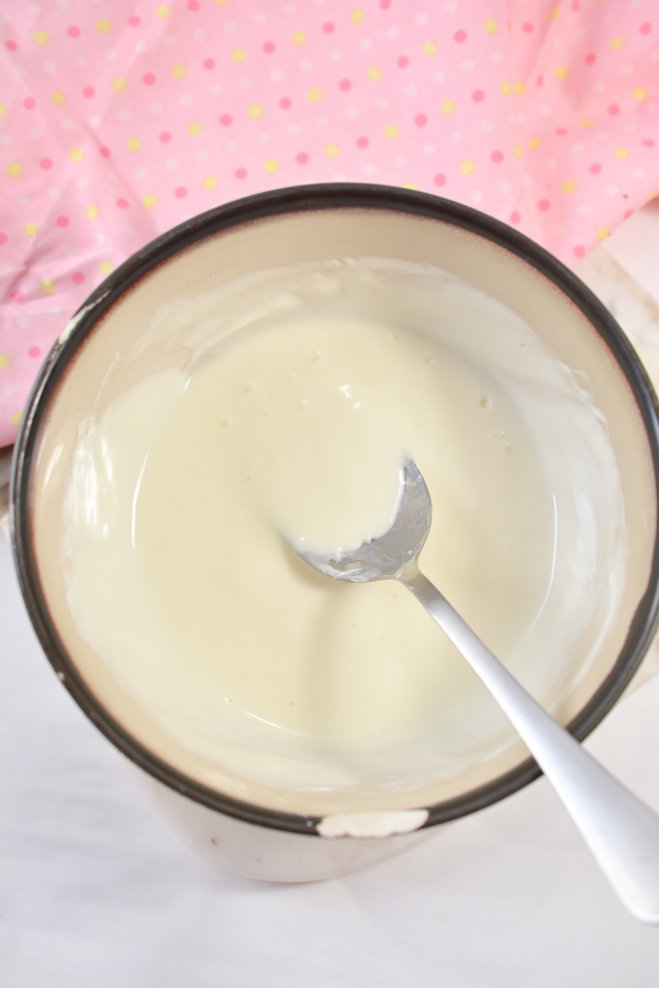 melted white chocolate in bowl