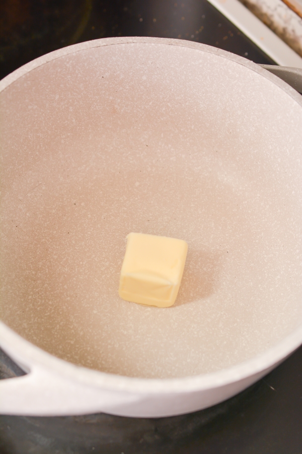 butter being melted into a saucepan