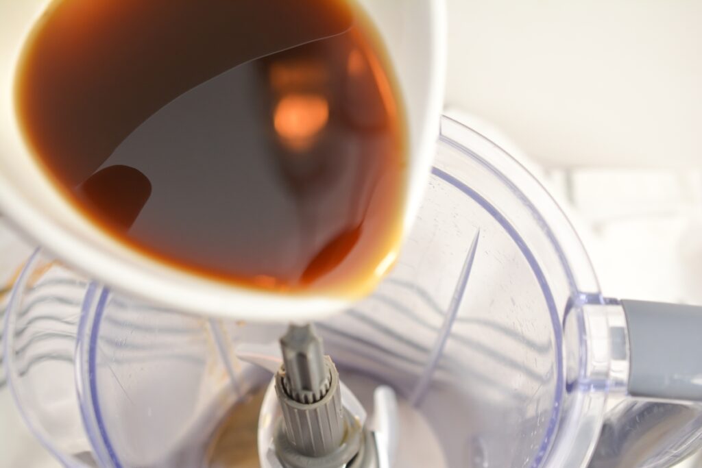 coffee being poured into blender