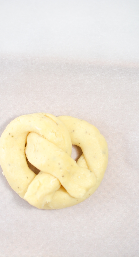 pretzel shaped dough ready to be baked
